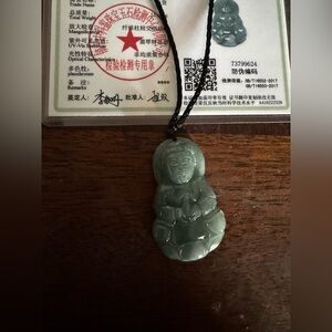 Genuine jadeite Asian goddess over an inch rich green jade color